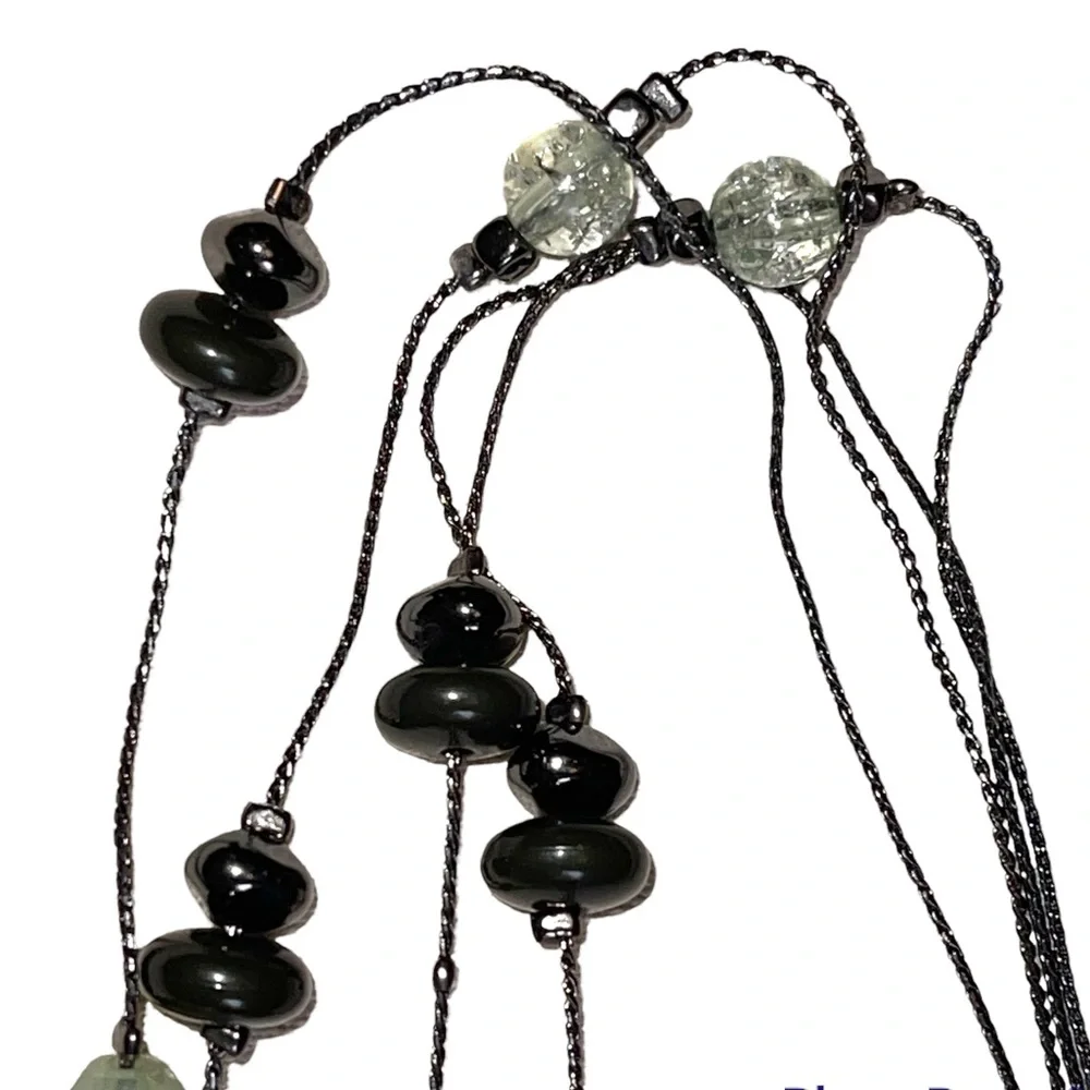 Double stranded designer necklace with multi faceted stones in euc